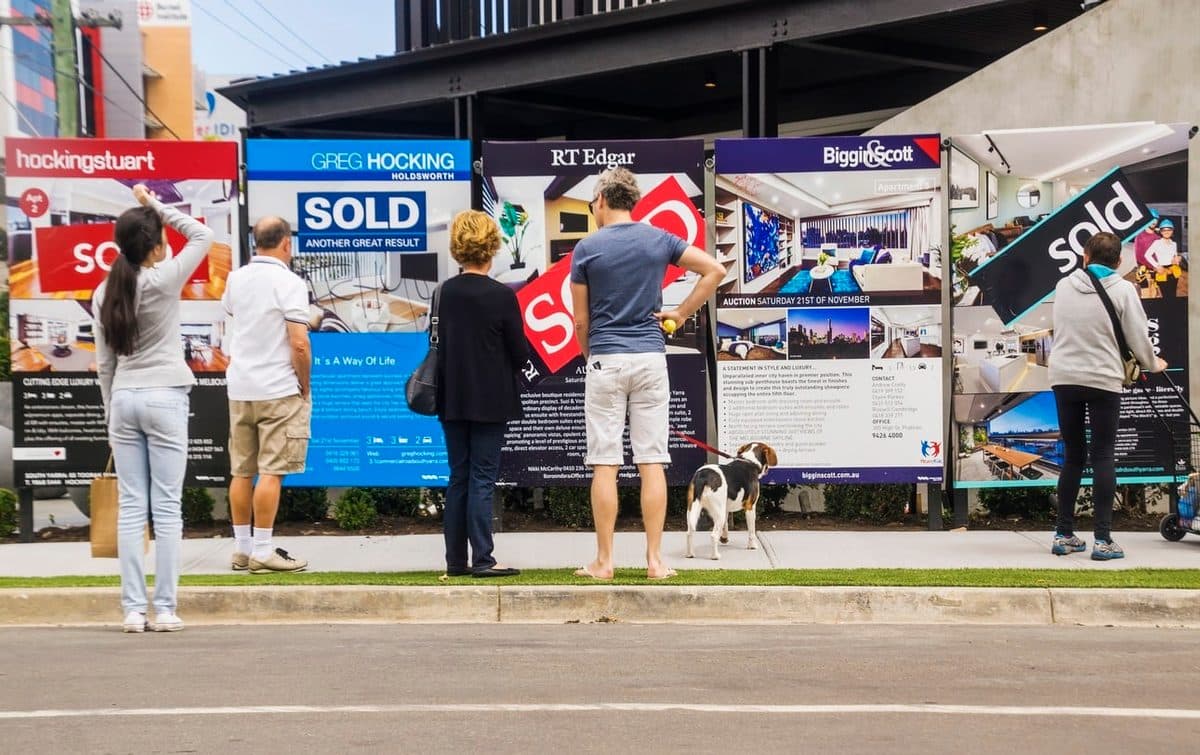 Melbourne real estate agent showing property to clients
